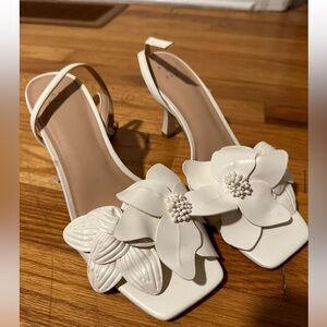 Worn once. Size 7.5. Target brand white flower small heels